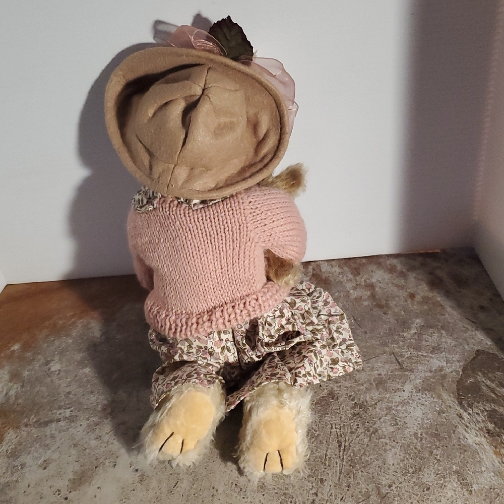 Charming Teddy Bear with Pink Outfit and Floral Hat - Picture 2 of 4
